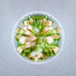 High angle view of salad in bowl on table