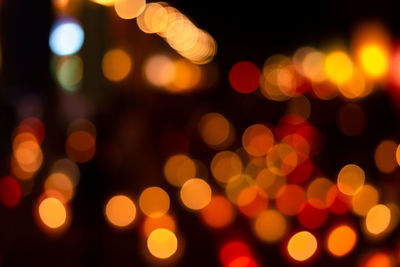 Defocused image of illuminated lights at night