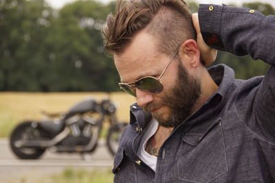 Close-up of young man wearing sunglasses