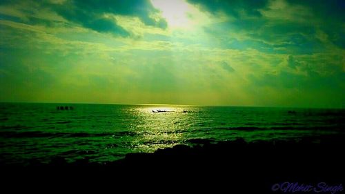 Scenic view of sea at sunset