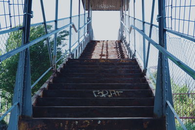 Low angle view of staircase amidst building