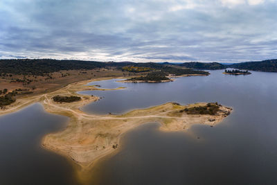 Drone aerial view of idanha dam marechal carmona landscape with beautiful lake water, in portugal