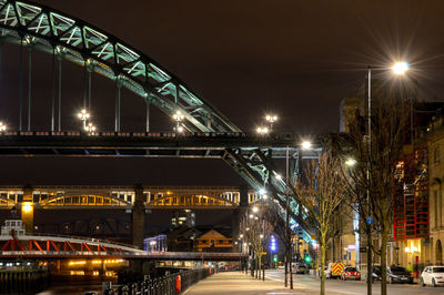 Illuminated street lights at night