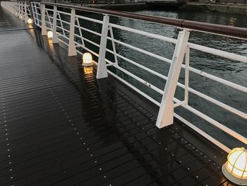 High angle view of illuminated staircase by footpath