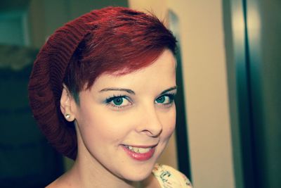 Close-up portrait of a smiling young woman