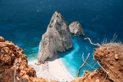 High angle view of rock formation in sea