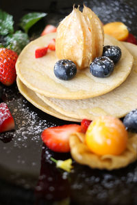 Close-up of cake served on table