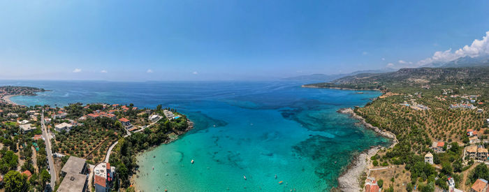 High angle view of sea against blue sky. a panoramic view from kalogria beach in stoupa, greece.