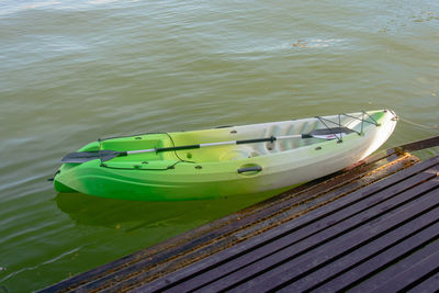 High angle view of boat moored at lake