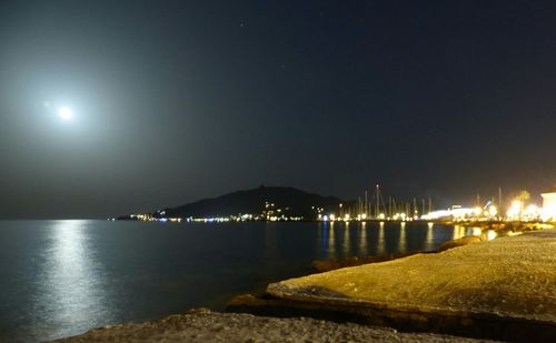 View of pier at night