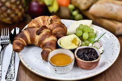 Close-up of breakfast served on table