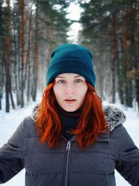 Portrait of young woman in winter