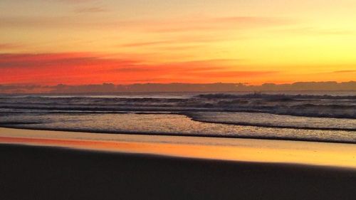 Scenic view of dramatic sky during sunset