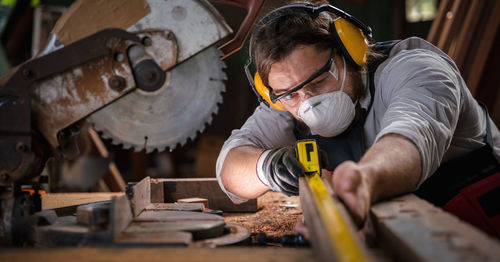 Man working on wood