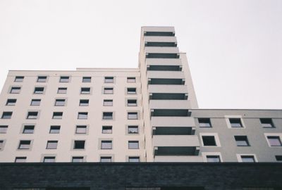 Low angle view of modern building against clear sky