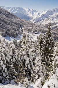 Scenic view of snow covered mountains