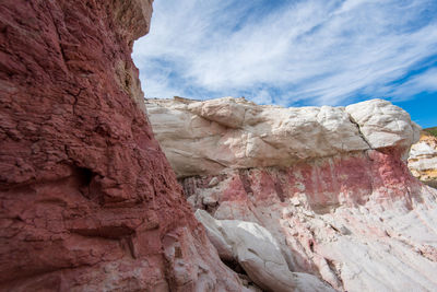 Landscape of pink, orange and white rock formations at interpretive paint mines in colorado