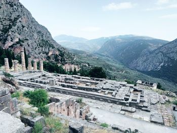 Aerial view of a town with mountain range in background