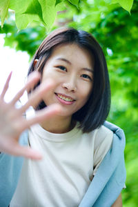 Portrait of young woman looking away