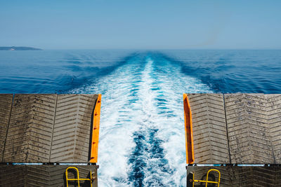 Scenic view of swimming pool by sea against sky