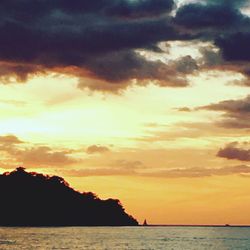 Dramatic sky over sea during sunset