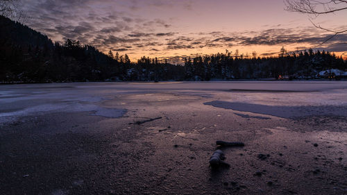 Scenic view of landscape against sky during sunset