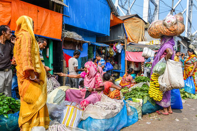 Group of people at market