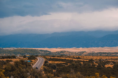 High angle view of road amidst landscape against sky