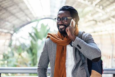 Portrait of young man standing outdoors