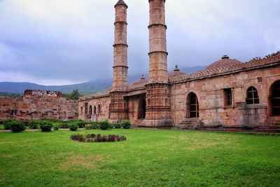 View of historic building against cloudy sky