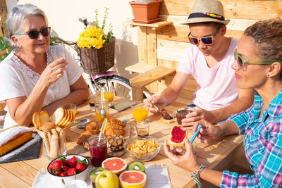 High angle view of people having food