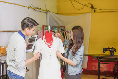 Rear view of woman standing on stage