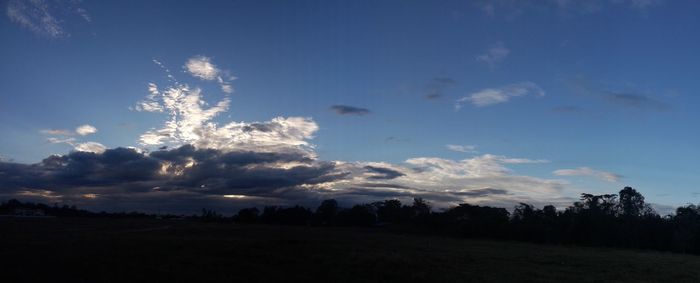 Silhouette trees against sky