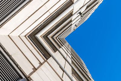 Low angle view of modern buildings against clear sky