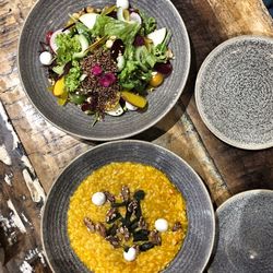 High angle view of chopped vegetables in bowl on table