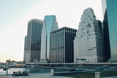 Low angle view of skyscrapers against clear sky