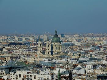 Aerial view of townscape against clear sky