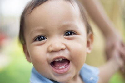 Close-up portrait of cute smiling girl