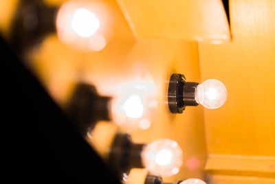 Close-up of illuminated light bulb