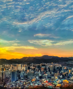 High angle view of townscape against sky during sunset