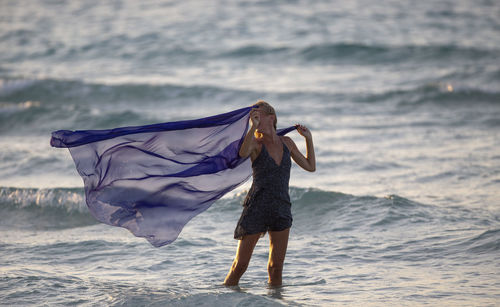 A woman poses