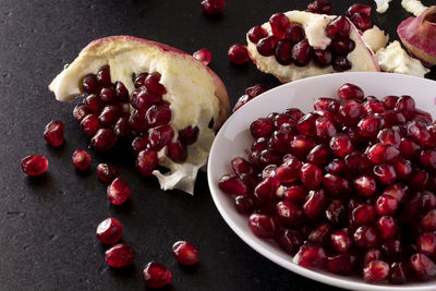 High angle view of strawberries in bowl on table