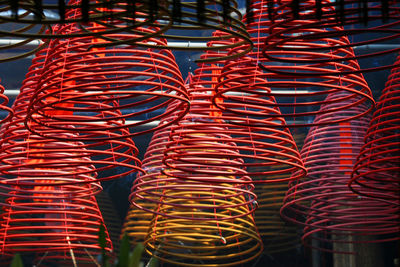 Close-up of spiral shaped incenses in temple