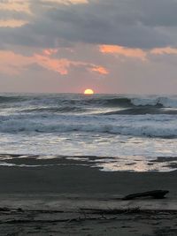 Scenic view of sea against sky during sunset