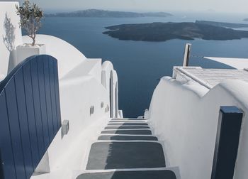 High angle view of steps leading towards sea