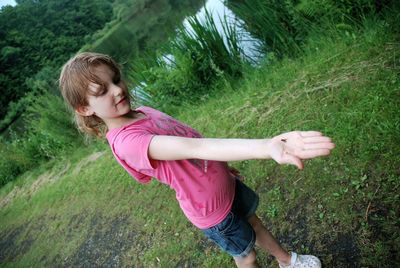 Full length of girl on field