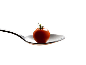 Close-up of apple against white background