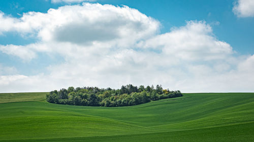 Scenic view of land against sky