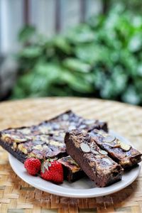 Close-up of served brownies and fruit