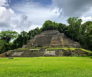 Ruins of temple against cloudy sky